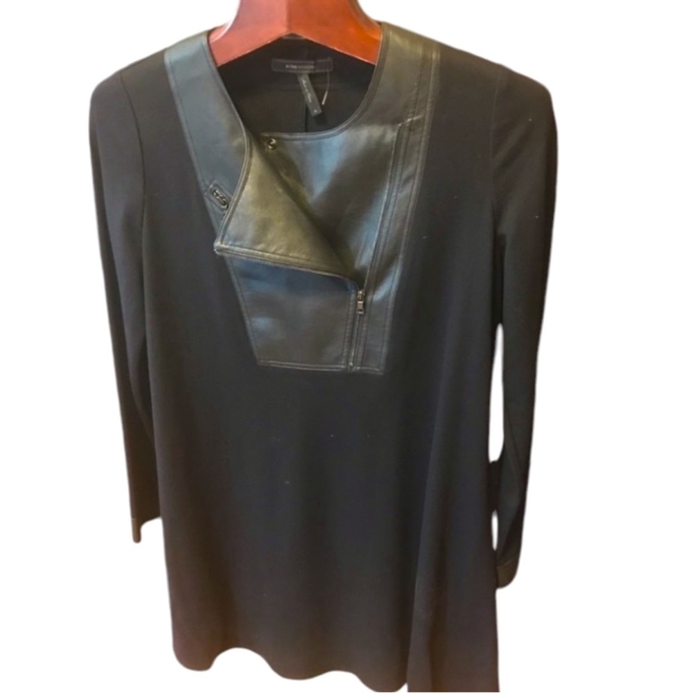 BCBG dress with leather look details. Size M. Beautiful flow.  Great quality.